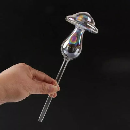 Automatic self-watering plant device in decorative designs including birds, stars, and mushrooms