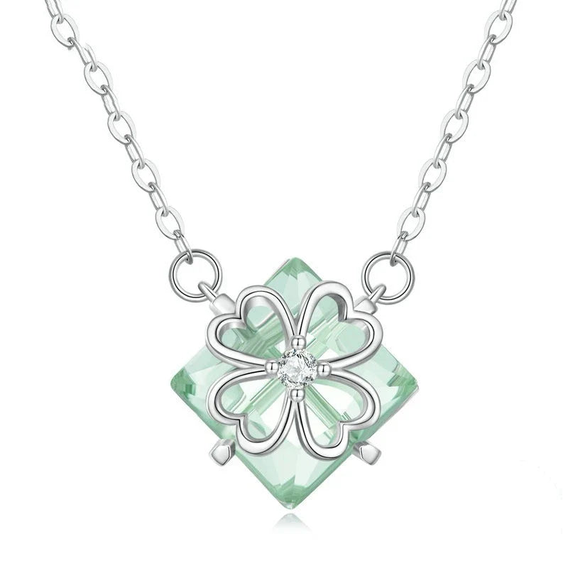 Elegant platinum-plated adjustable green pendant necklace with a sleek, silver-toned chain and a stylish green pendant