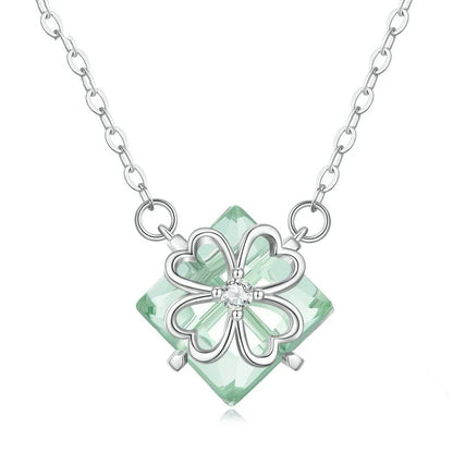 Elegant platinum-plated adjustable green pendant necklace with a sleek, silver-toned chain and a stylish green pendant