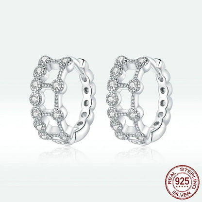 Elegant double-layered electroplated silver earrings with a minimalist, sophisticated design