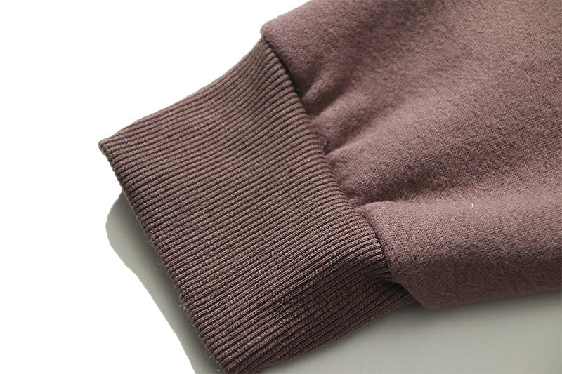 Cozy loose knit sweaters in a rich coffee color with a relaxed, oversized fit for ultimate comfort and style.
