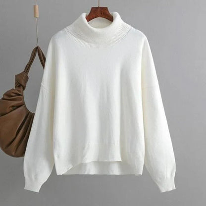 Chic and cozy oversized turtleneck sweater for women in a solid color, perfect for cold weather fashion and style
