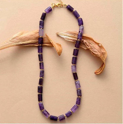 Elegant red natural stone necklace with an adjustable stainless steel chain, perfect for adding a touch of natural beauty to any outfit.