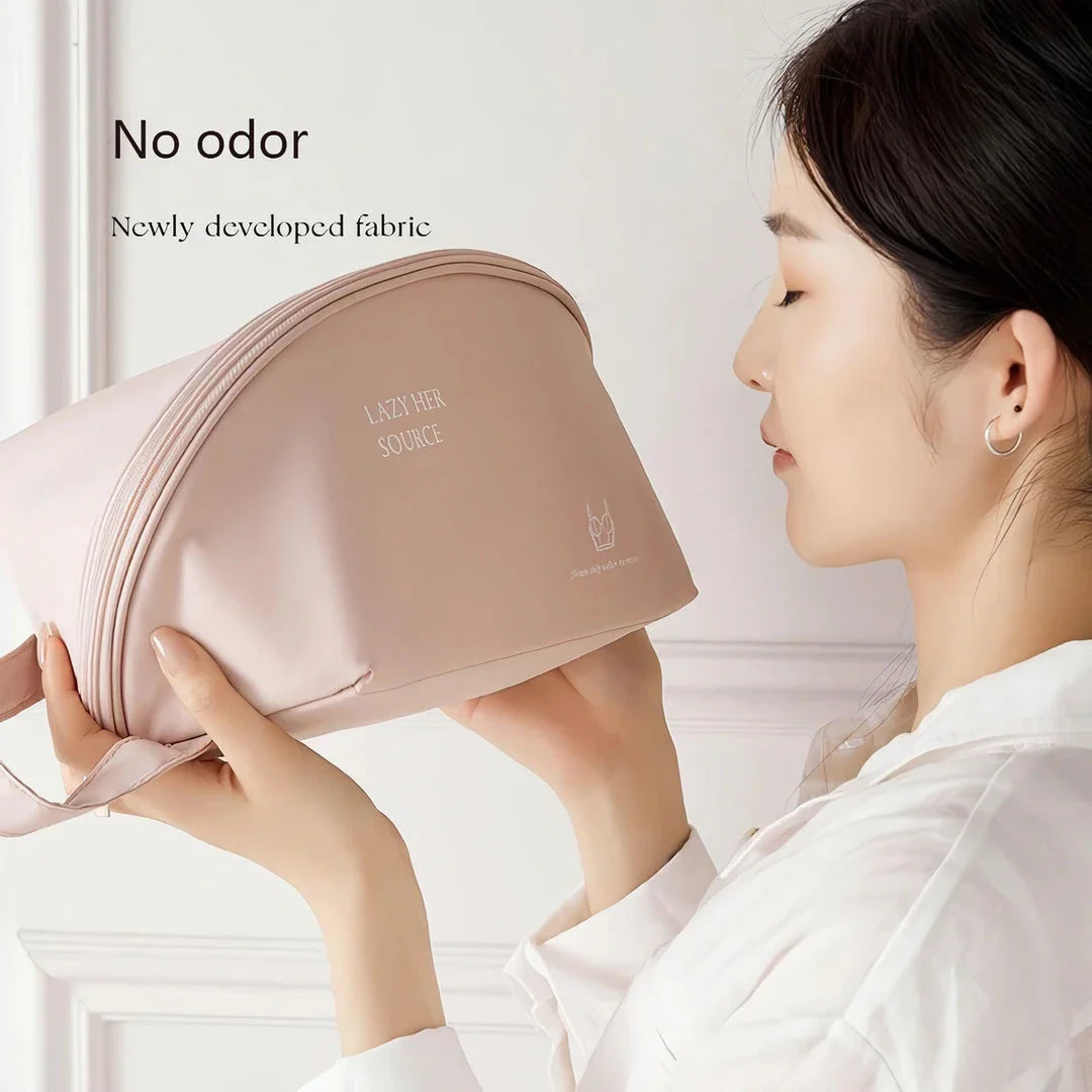 Compact travel underwear and lingerie organizer bag made of durable polyester for organized storage of bras, underwear, and socks while on the go.