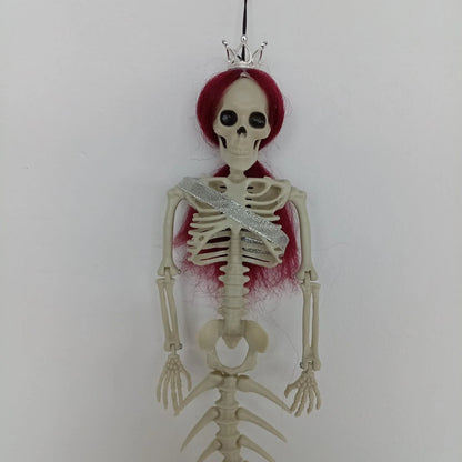 Mermaid bone pendant in various colors, including brown, dark purple, burgundy, and lake blue, hanging outdoors for Halloween decoration