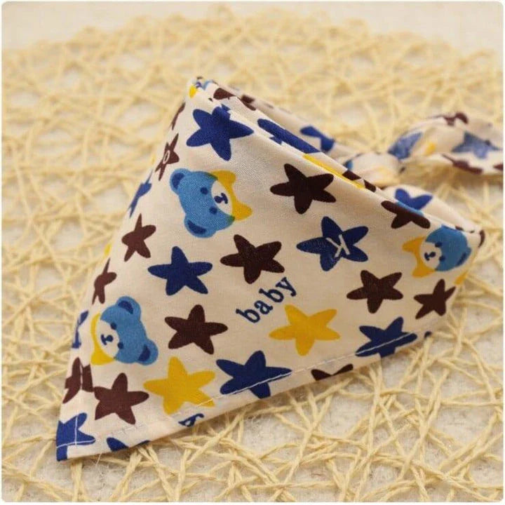 Adorable Cartoon Patterned Triangular Dog Scarf in vibrant colors, perfect for keeping your pup warm and stylish
