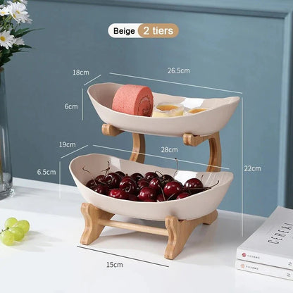 Three-tier plastic and bamboo fruit display tray with unique leaf-shaped design, available in white, beige, and green colors