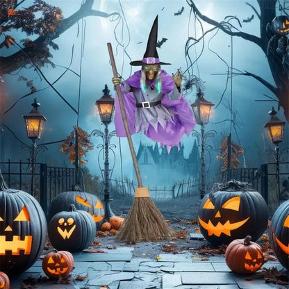 Large 6-foot animated floating witch decoration for outdoor Halloween, with lifelike facial features and flowing purple skirt