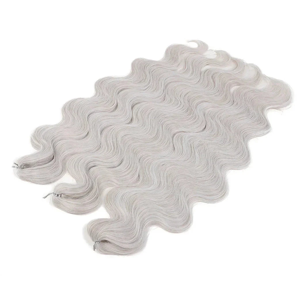 Ombre body wave crochet hair extensions in 24-inch length with seamless dark to light color blend