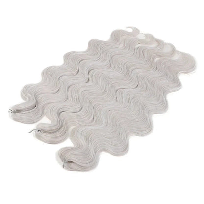 Ombre body wave crochet hair extensions in 24-inch length with seamless dark to light color blend