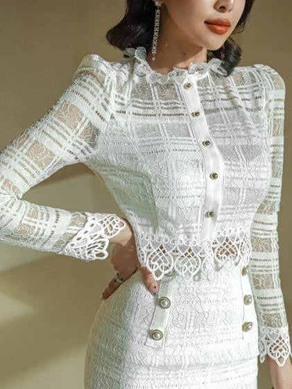 Elegant lace two-piece suit with Chanel-inspired design, featuring a long-sleeved top and short skirt in a sophisticated white color.