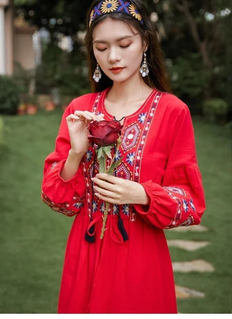 Elegant embroidered cotton-linen dress with tassels, featuring a waist-cinching A-line silhouette in vibrant colors