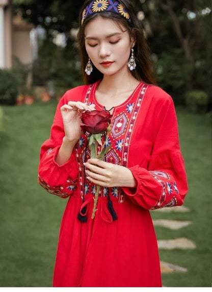 Elegant embroidered cotton-linen dress with tassels, featuring a waist-cinching A-line silhouette in vibrant colors