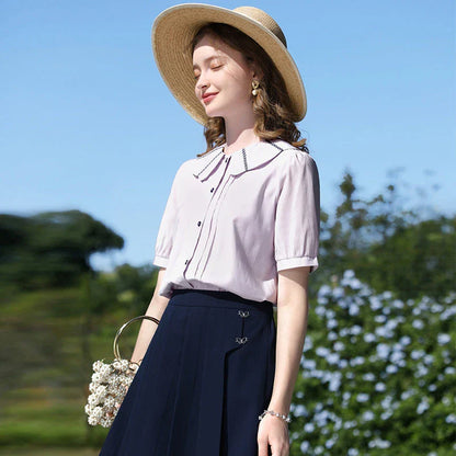 Stylish French Puff Sleeve Blouse with Classic Peter Pan Collar - A sophisticated and chic blouse for the modern, fashion-forward woman