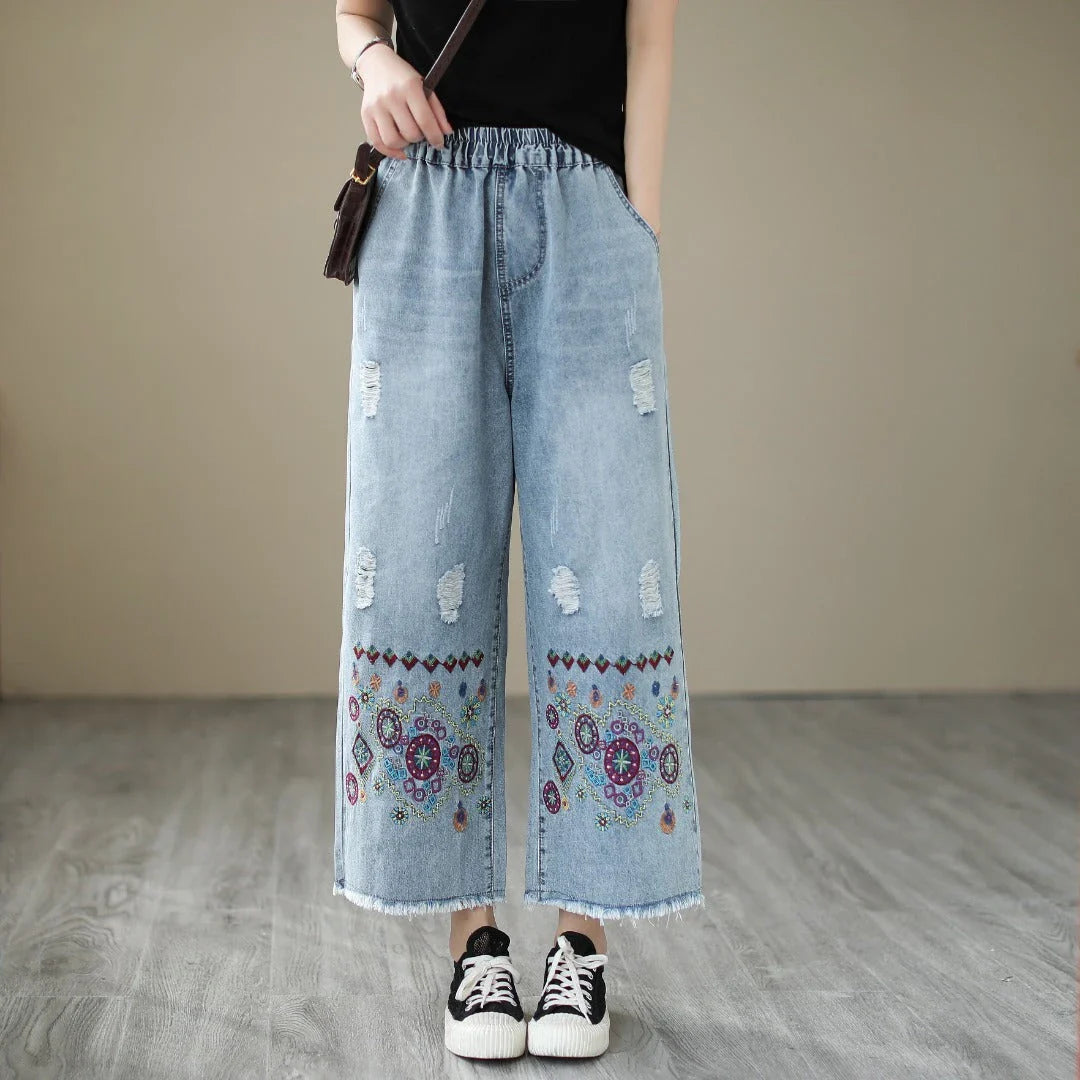 Fashionable embroidered ripped denim straight jeans with a relaxed yet flattering silhouette
