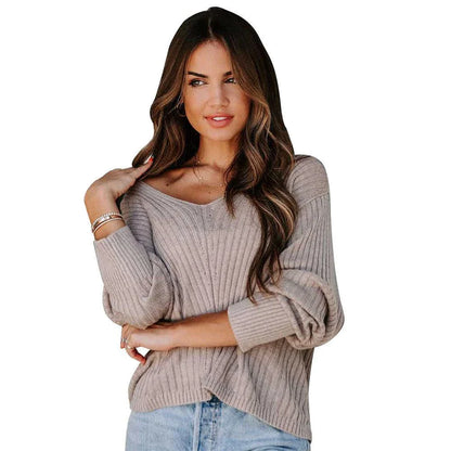A cozy and stylish long sleeve v-neck sweater in various colors, perfect for casual wear and everyday outfitting.