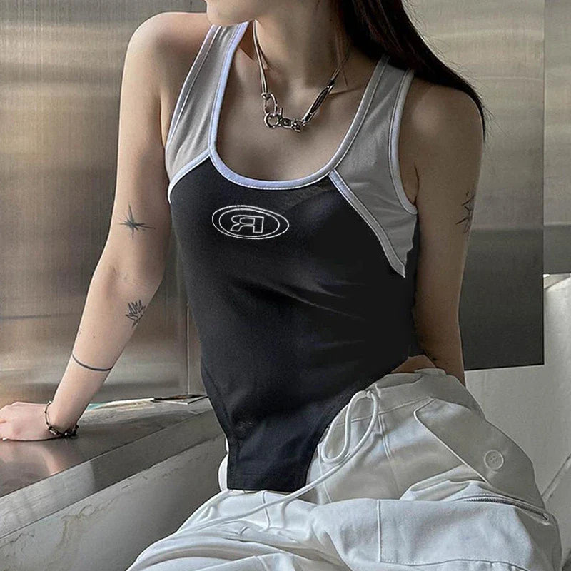 A stylish suspender vest with tailored fit, unique stitching details, and contoured hem for a modern, elevated look