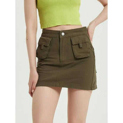 Chic green denim high-waist pencil skirt with convenient pockets, offering a flattering and versatile look for any occasion.