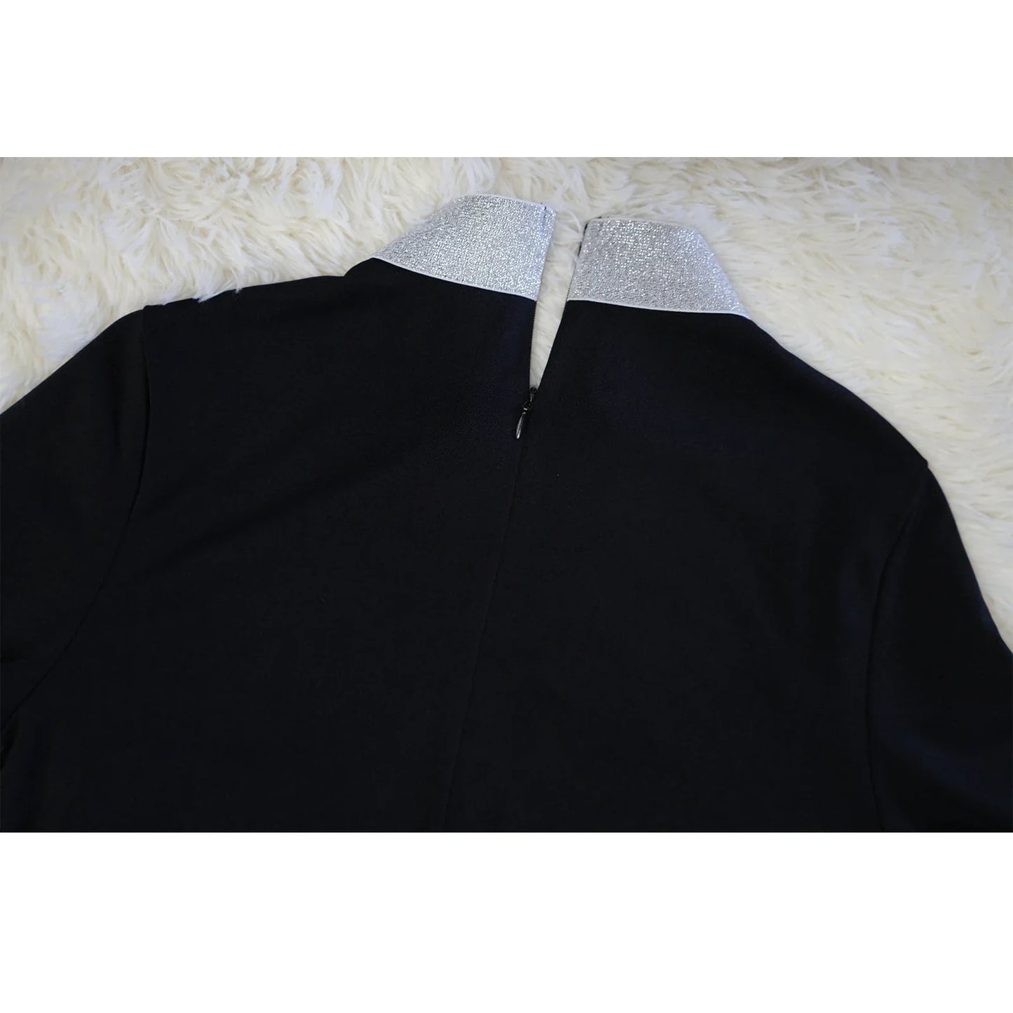 Stylish and flattering waist-accentuating split dress in solid colors, made from premium polyester fabric for comfort and versatility.