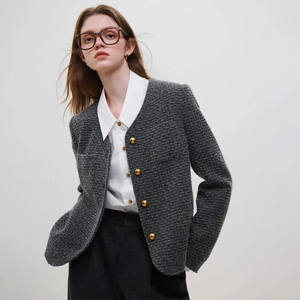 Sophisticated women's winter wool tweed jacket with stylish v-neck collar and single-breasted closure for a classic French look