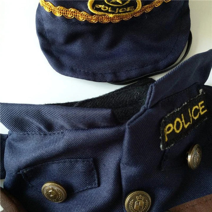 A soft, cotton pet costume designed as a policeman uniform, with a badge and cap, perfect for dressing up your dog or cat for Halloween or other celebrations.