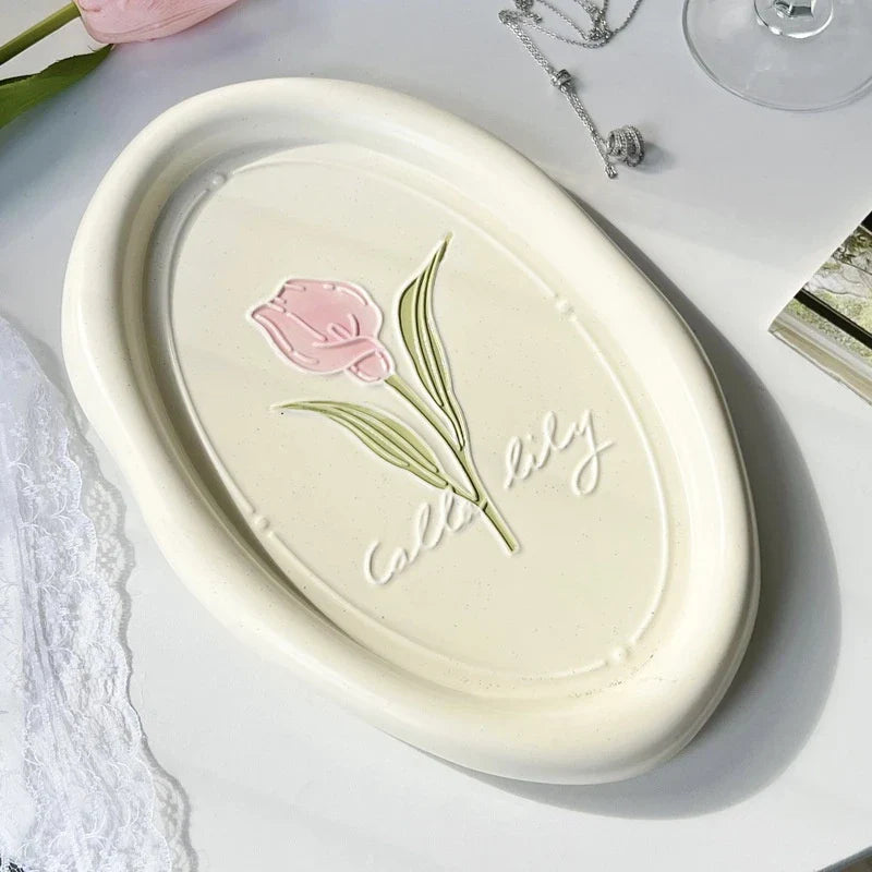 Elegant ceramic plate with French-inspired Calla Tulip floral relief pattern, perfect for formal and casual dining settings