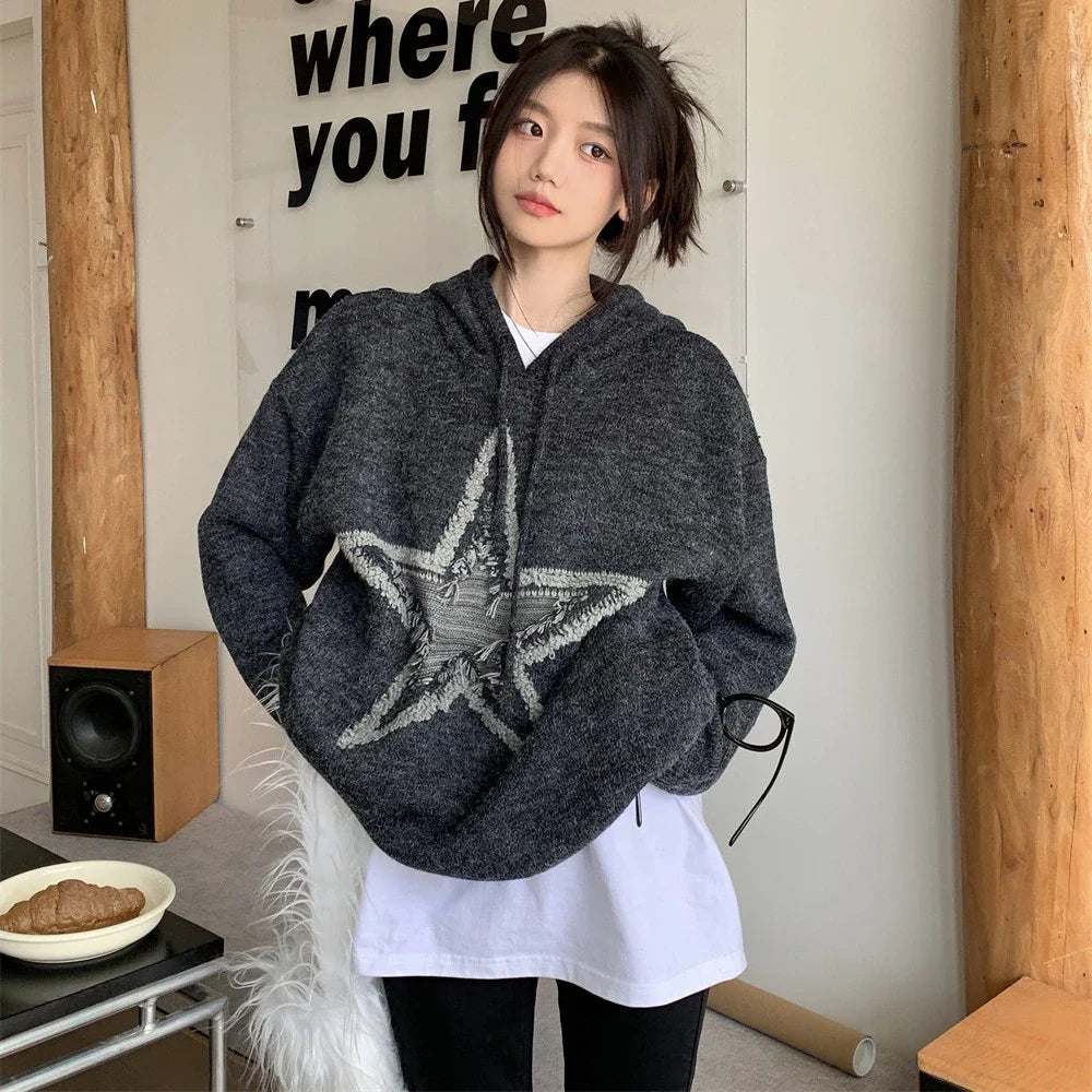 A cozy, vintage-inspired sweater with a five-pointed star design, made in America with premium polyester for lasting comfort and style.