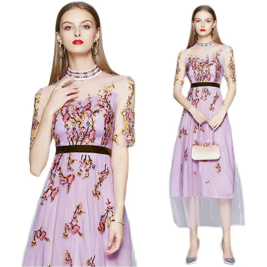 Elegant ladies' dress with embroidered mesh pattern, five-point sleeves, and flowing long skirt