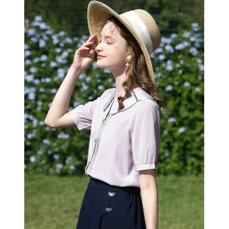 Stylish French Puff Sleeve Blouse with Classic Peter Pan Collar - A sophisticated and chic blouse for the modern, fashion-forward woman