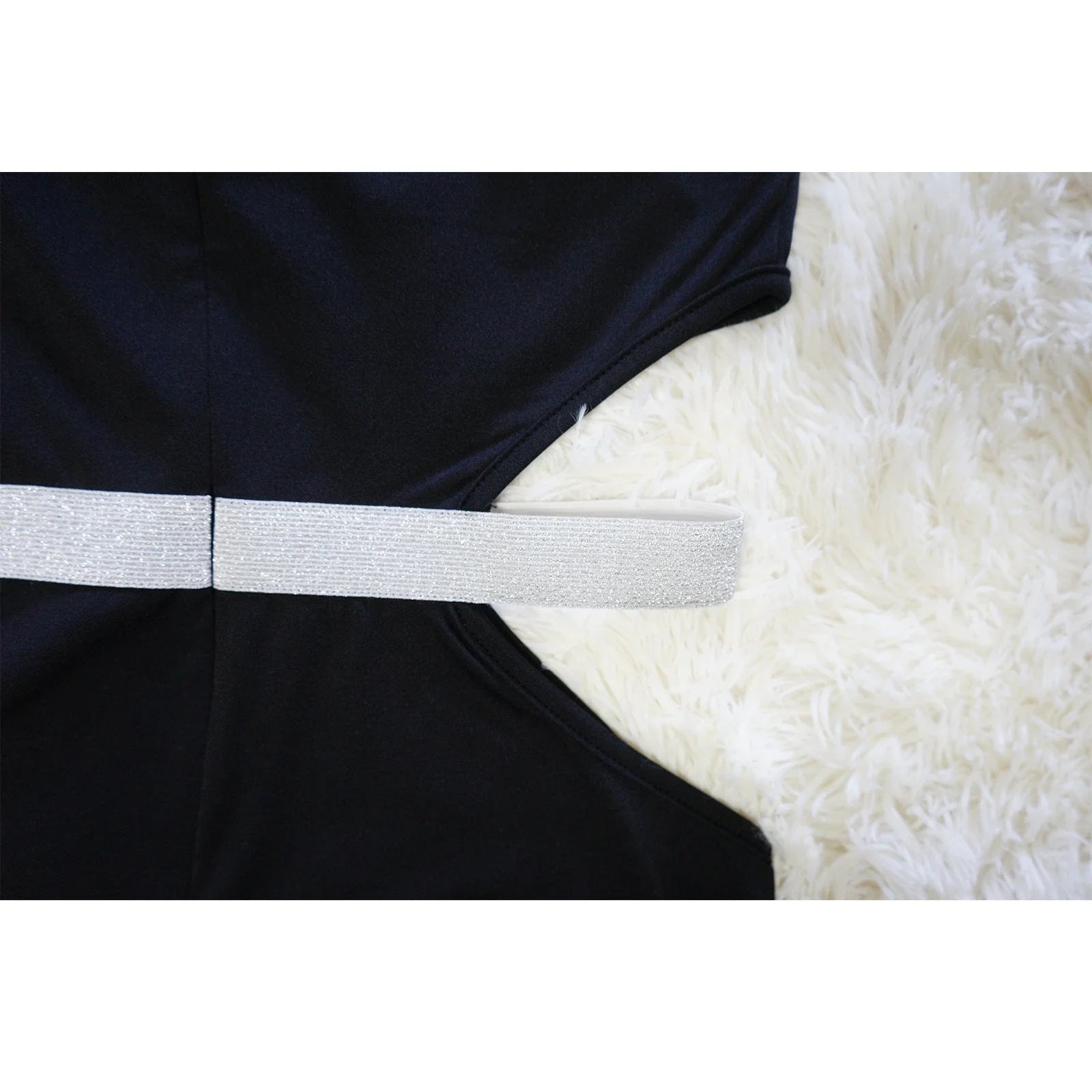 Stylish and flattering waist-accentuating split dress in solid colors, made from premium polyester fabric for comfort and versatility.