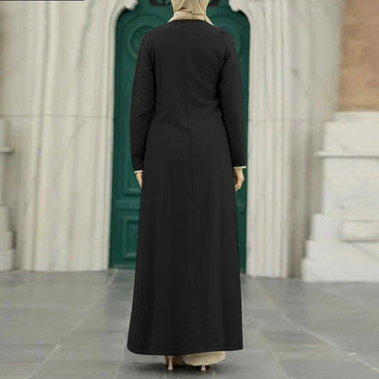 Elegant polyester dress with long sleeves, high slit hem, and available in caramel, black, blue, green, and pink colors