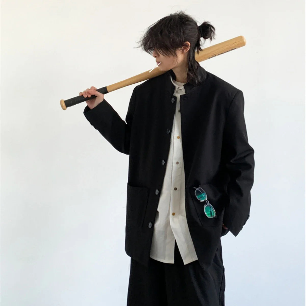 Premium casual men's Zhongshan jacket in black with stand collar design, made from durable wool blend material for sophisticated style and comfort.