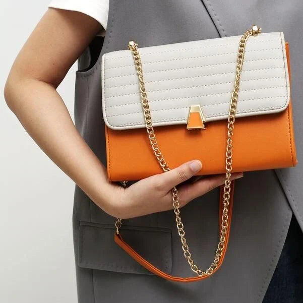 Color Block Quilted Vegan Leather Fashion Shoulder Bag in Orange with Decorative Lock and Chain Detail