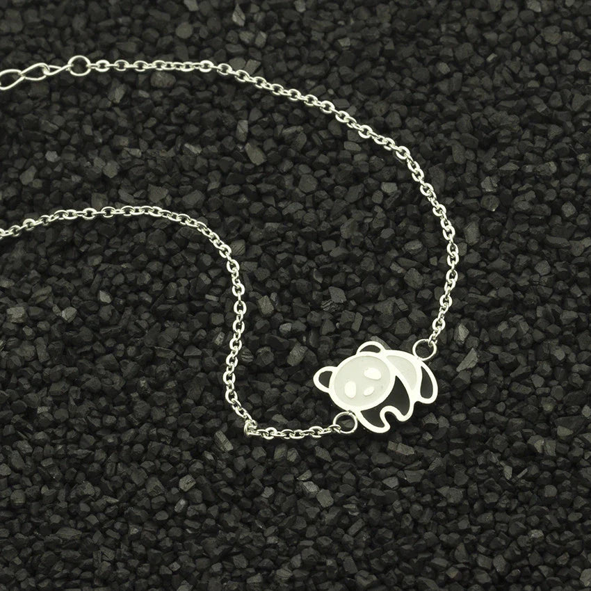 Elegant gold-plated stainless steel bracelet with a delicate panda charm, perfect for fashion-conscious women