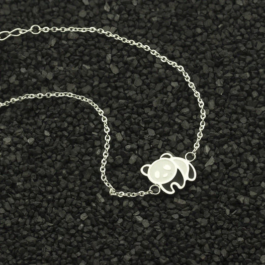 Elegant gold-plated stainless steel bracelet with a delicate panda charm, perfect for fashion-conscious women