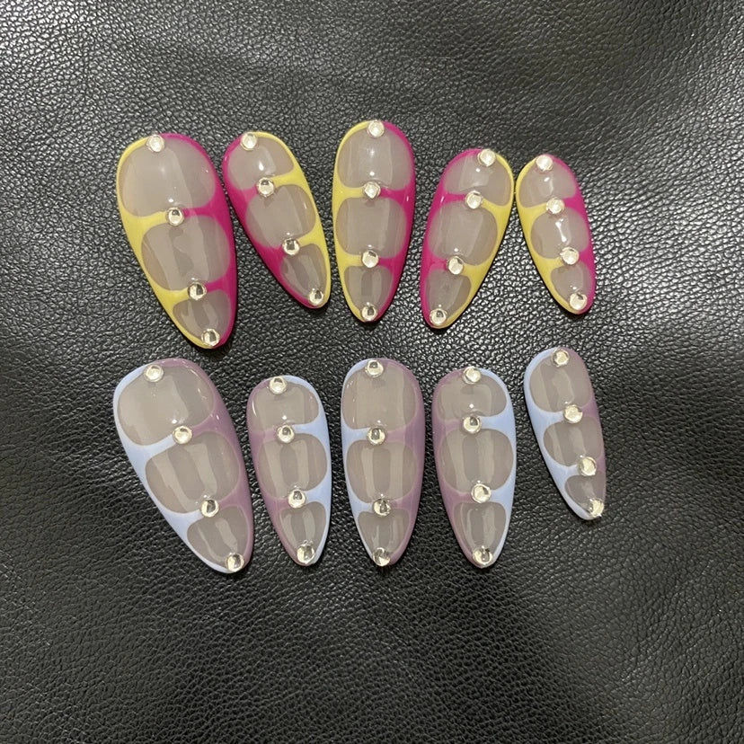 Handcrafted Almond French Nail Art in various sizes for custom wear and enhanced personal style