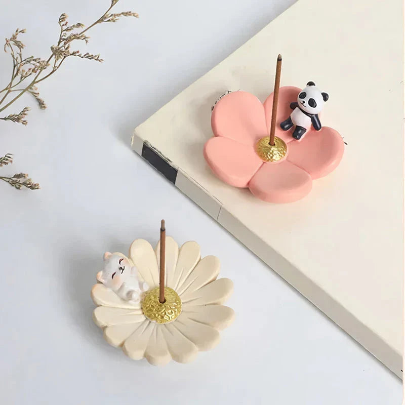 Elegant mini resin incense holder with cherry blossom, water lily, plum blossom, and daisy motifs for calming aromatherapy experience