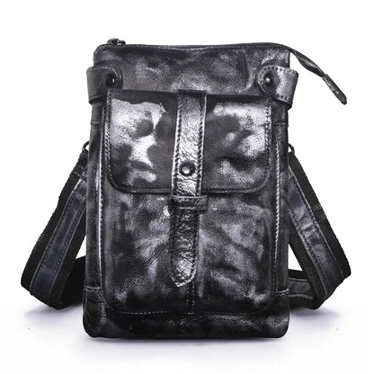 A premium cowhide leather shoulder bag with a compact and versatile design, suitable for various occasions and outdoor activities.