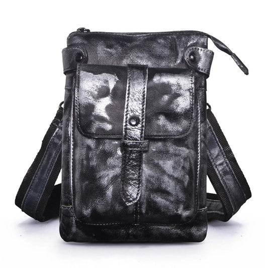 A premium cowhide leather shoulder bag with a compact and versatile design, suitable for various occasions and outdoor activities.