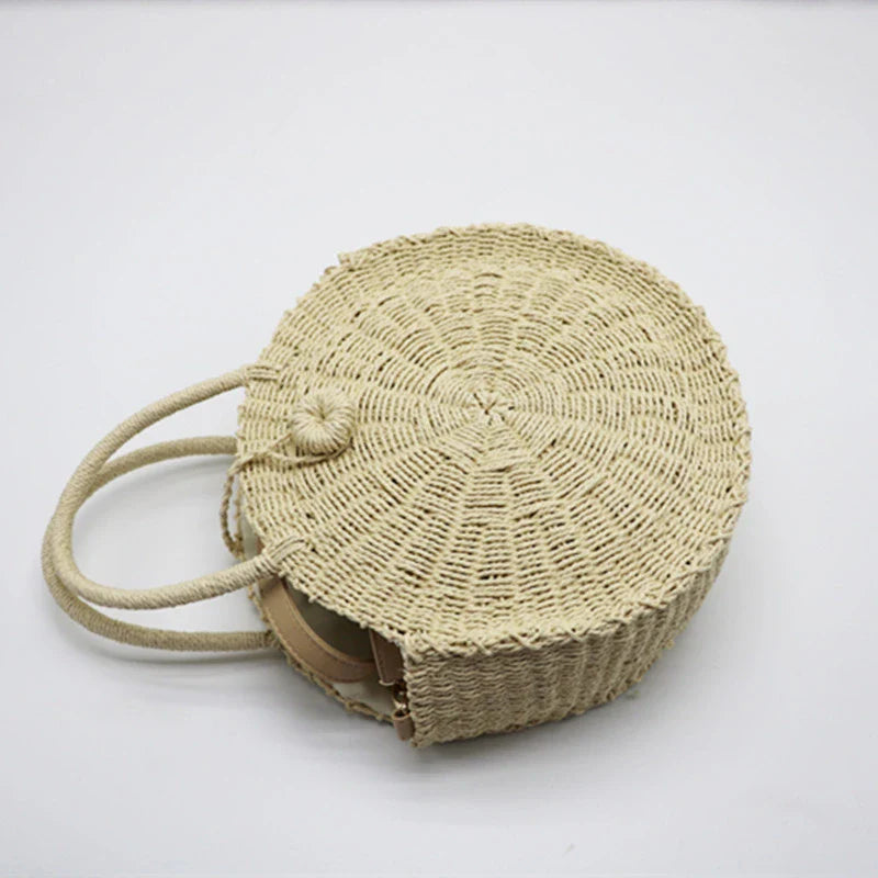 Stylish round straw woven handbag with zipper closure and comfortable carrying handle