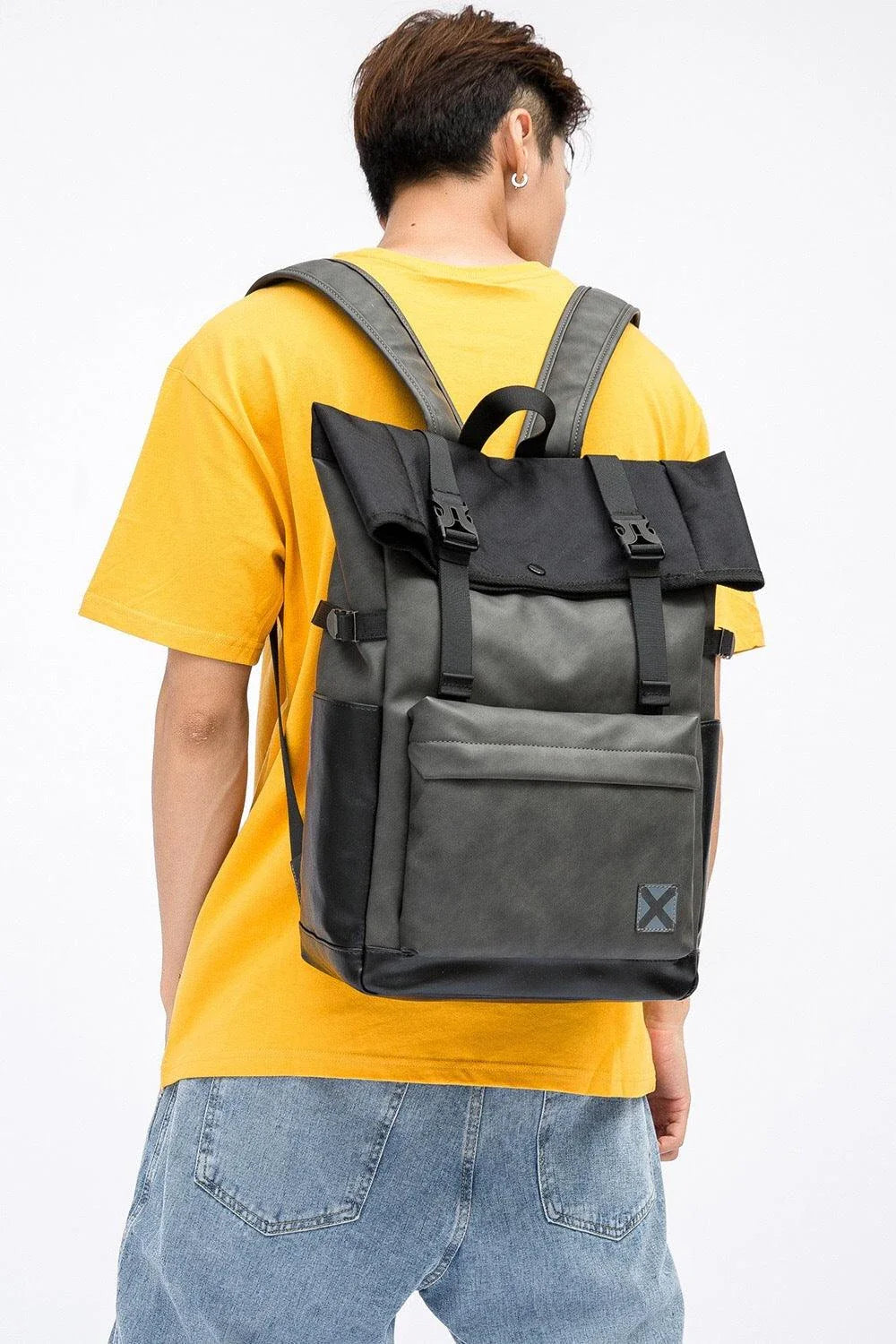 A large, high-quality PU leather backpack with a sleek, modern design and ample storage capacity