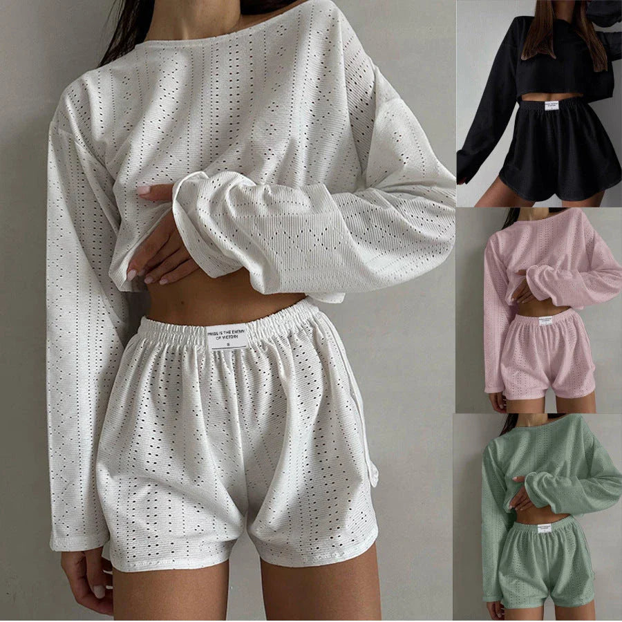 Trendha Women's Long Sleeve Pullover Top and Shorts Set in White, featuring a chic hollow-out design and flattering slim fit