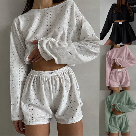 Trendha Women's Long Sleeve Pullover Top and Shorts Set in White, featuring a chic hollow-out design and flattering slim fit