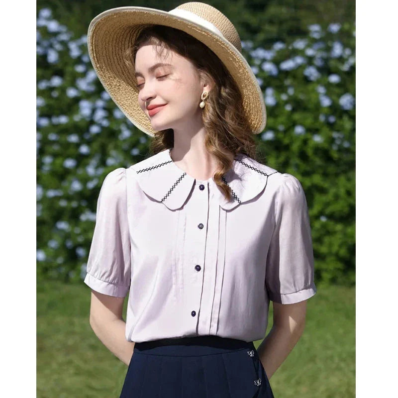 Stylish French Puff Sleeve Blouse with Classic Peter Pan Collar - A sophisticated and chic blouse for the modern, fashion-forward woman
