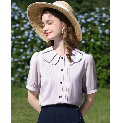 Stylish French Puff Sleeve Blouse with Classic Peter Pan Collar - A sophisticated and chic blouse for the modern, fashion-forward woman