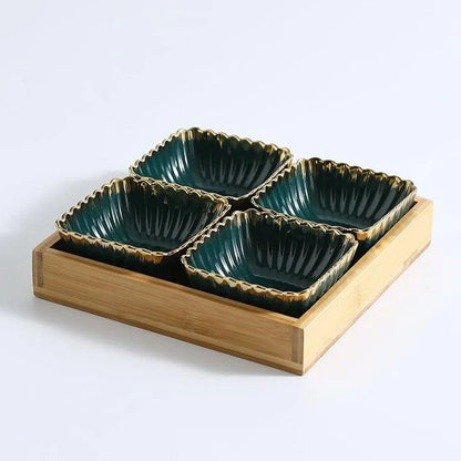 Elegant green and gold ceramic serving platter with a wood trim, perfect for hosting and elevating your dining experience.