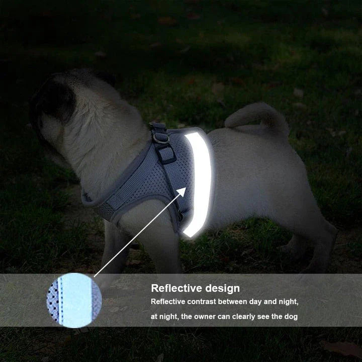 Adjustable reflective dog harness made of durable polyester material with reflective strips for enhanced visibility and safety during outdoor activities.