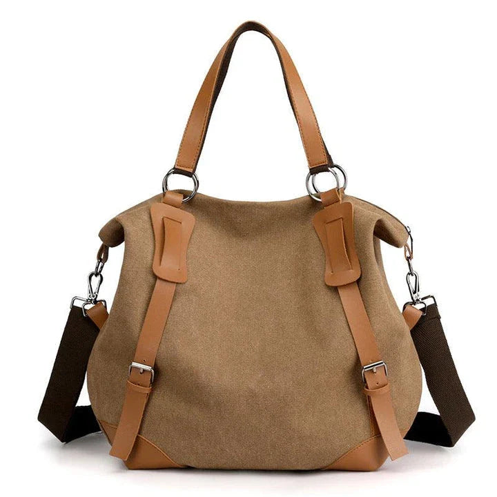 Versatile canvas shoulder bag in khaki color with multiple pockets and adjustable strap for everyday use