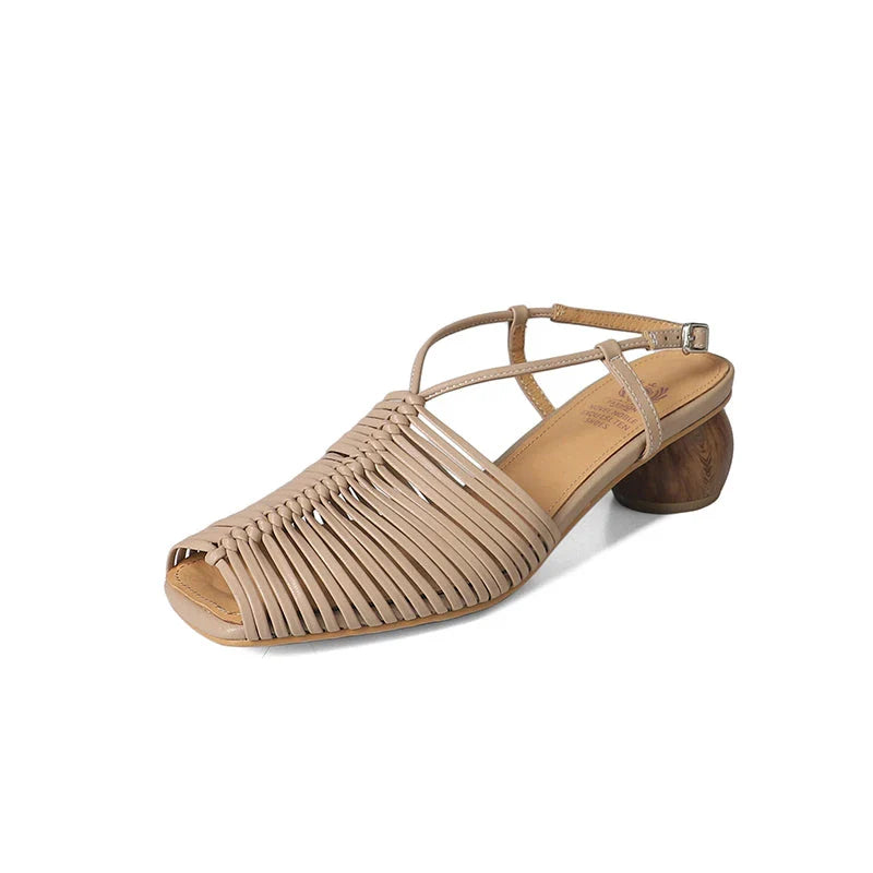 Stylish high heel genuine leather sandals in silver color with ankle strap and fashionable buckle closure