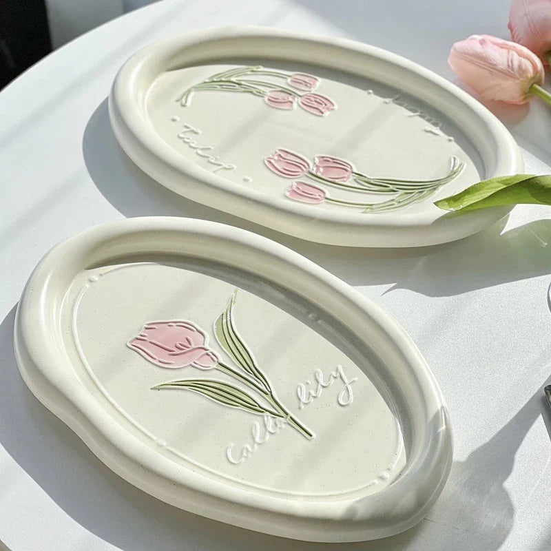 Elegant ceramic plate with French-inspired Calla Tulip floral relief pattern, perfect for formal and casual dining settings